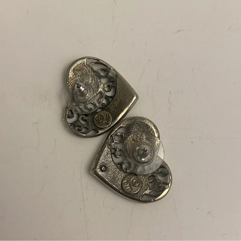 Two sets of heart earrings. Post earrings